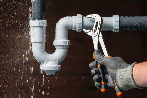 Professional Emergency Plumber technician working in Lowber, PA